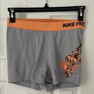 Nike Pro Gray Shorts with Orange Waistband